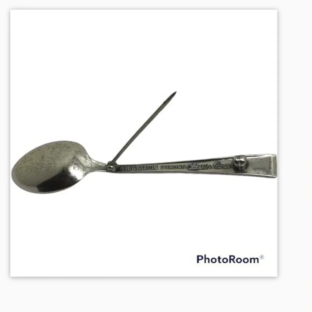 Sterling silver designer spoon brooch